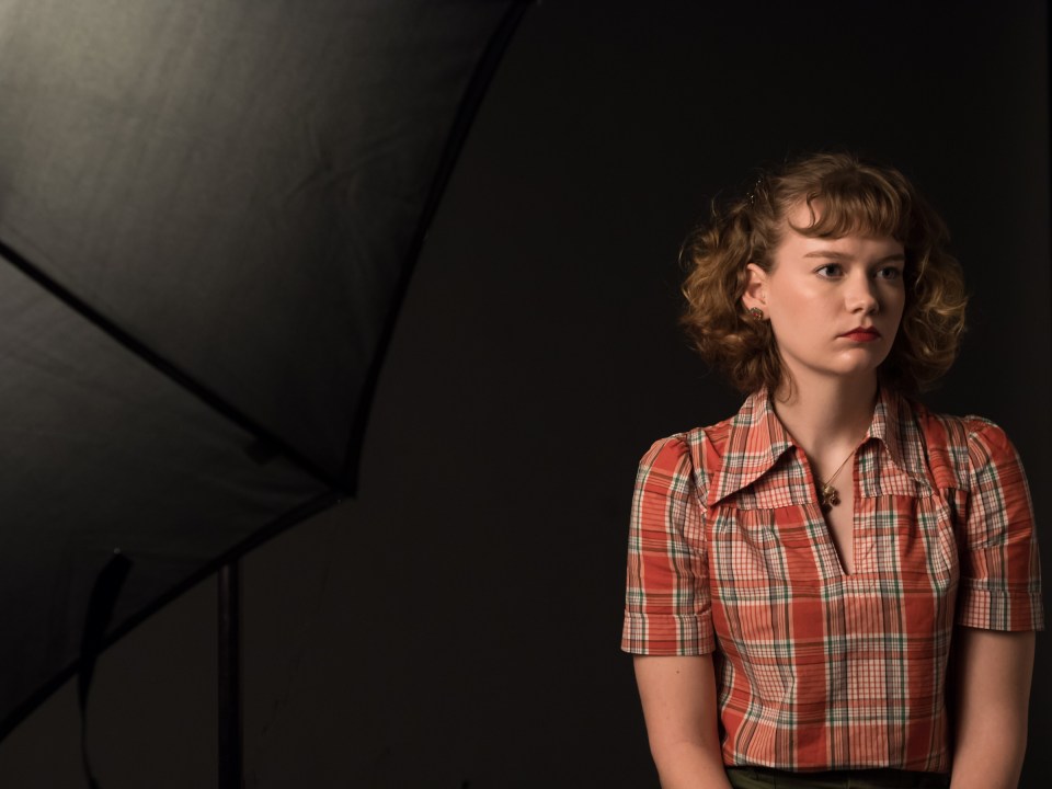 Portrait of a young woman in studio